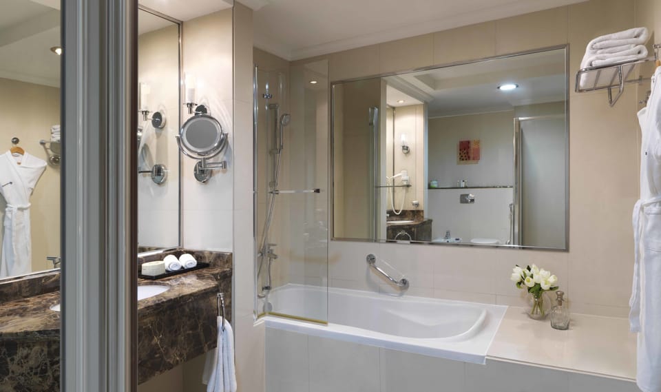 Separate tub and shower, hair dryer, bidet, towels