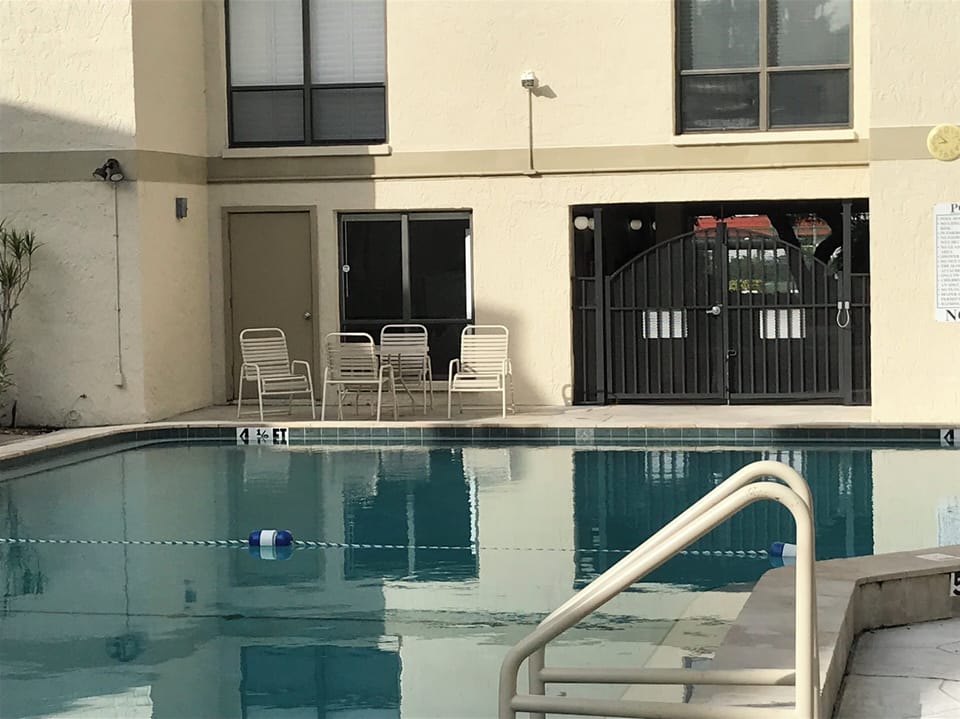 Pool area is 1 minute walk from front door; Club house & laundry facilities here