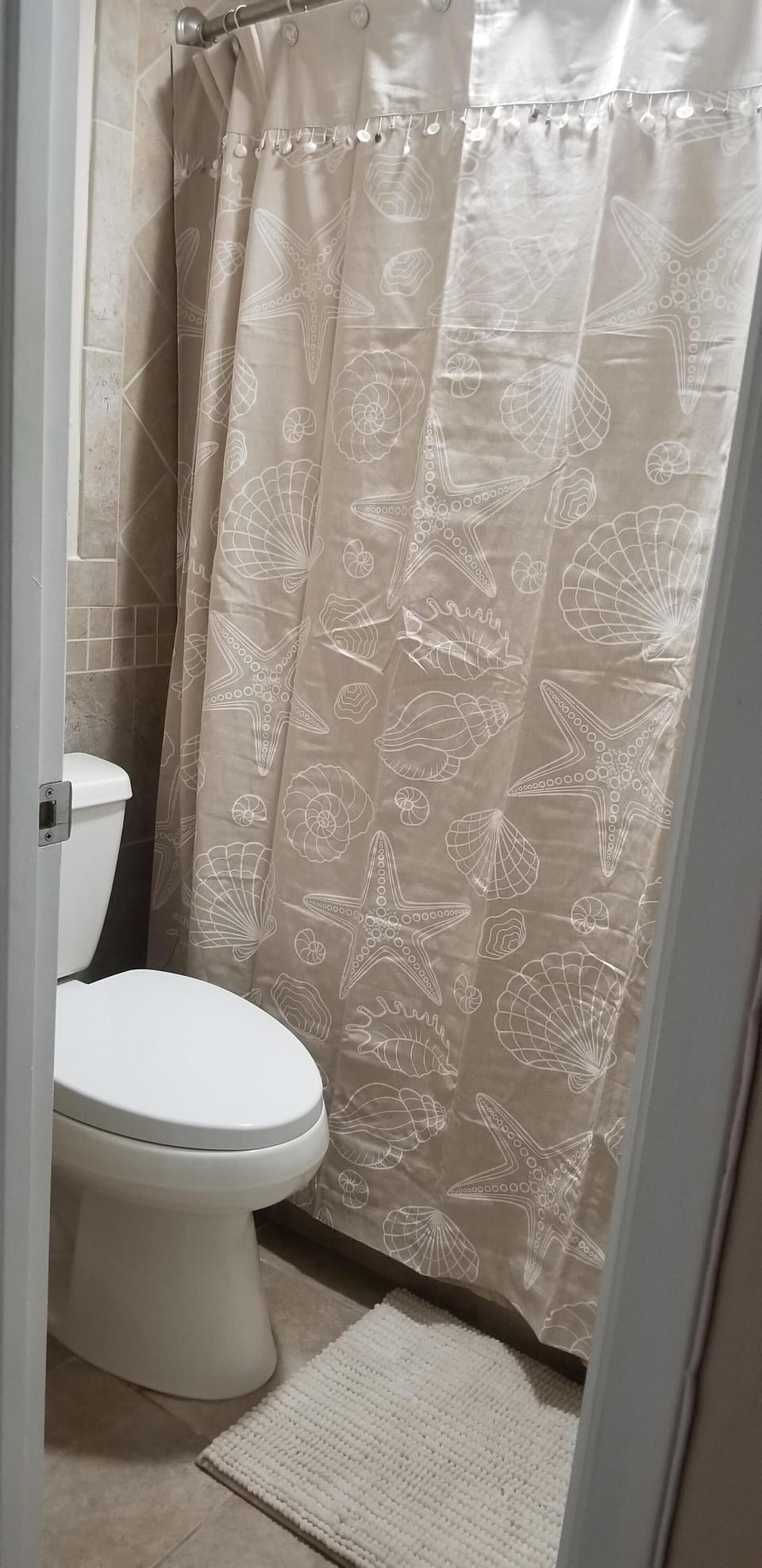 Separate room with toilet and full size shower