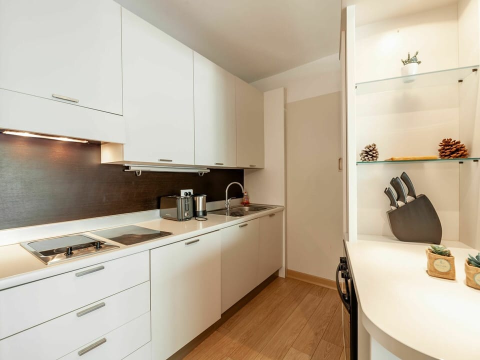 Cabinetry, Furniture, Countertop, Building, Kitchen Stove, Drawer, Wood, Sink, Kitchen, Flooring