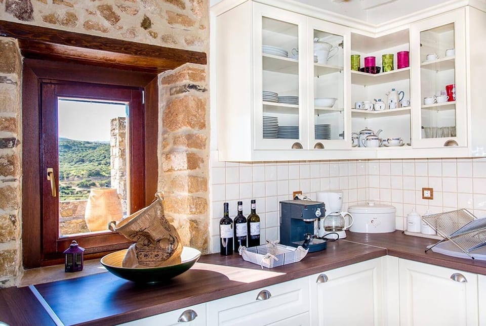 Kitchen window with view towards the terrace
