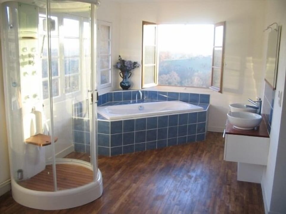 The master bathroom with stunning views over the valley