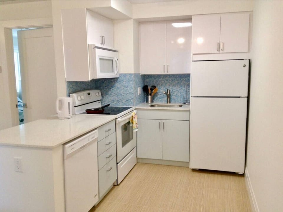 Kitchen with Fridg. dishwasher, stove, oven, micro, coffee maker