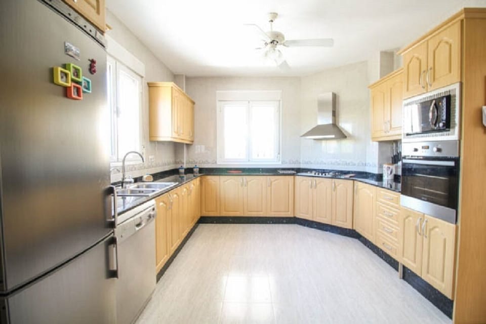 Bright, Modern, Spacious Kitchen. Fully fitted and kitted. Two windows.