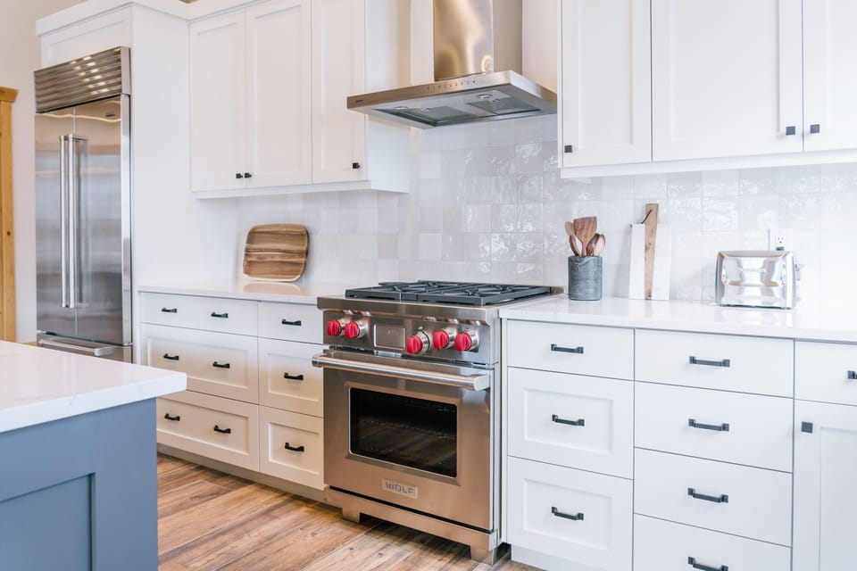Fully-stocked kitchen with state-of-the-art Wolf Range. 