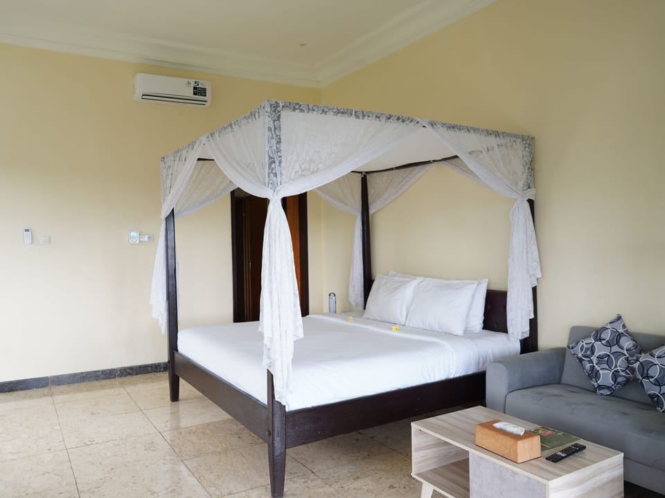 Junior Suite, Balcony | Minibar, desk, blackout drapes, individually decorated