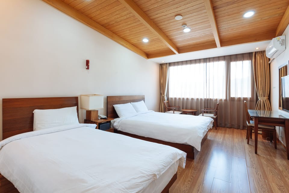 Deluxe Twin Room | Blackout drapes, free WiFi, wheelchair access