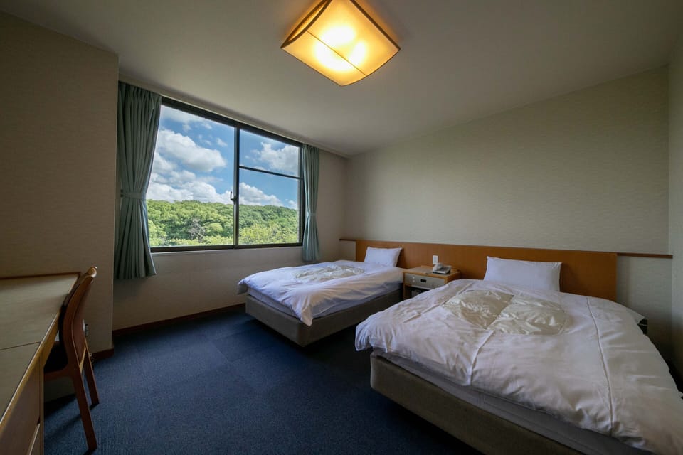 Twin Room | Iron/ironing board, free WiFi, bed sheets