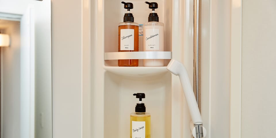 Shower, free toiletries, hair dryer, slippers