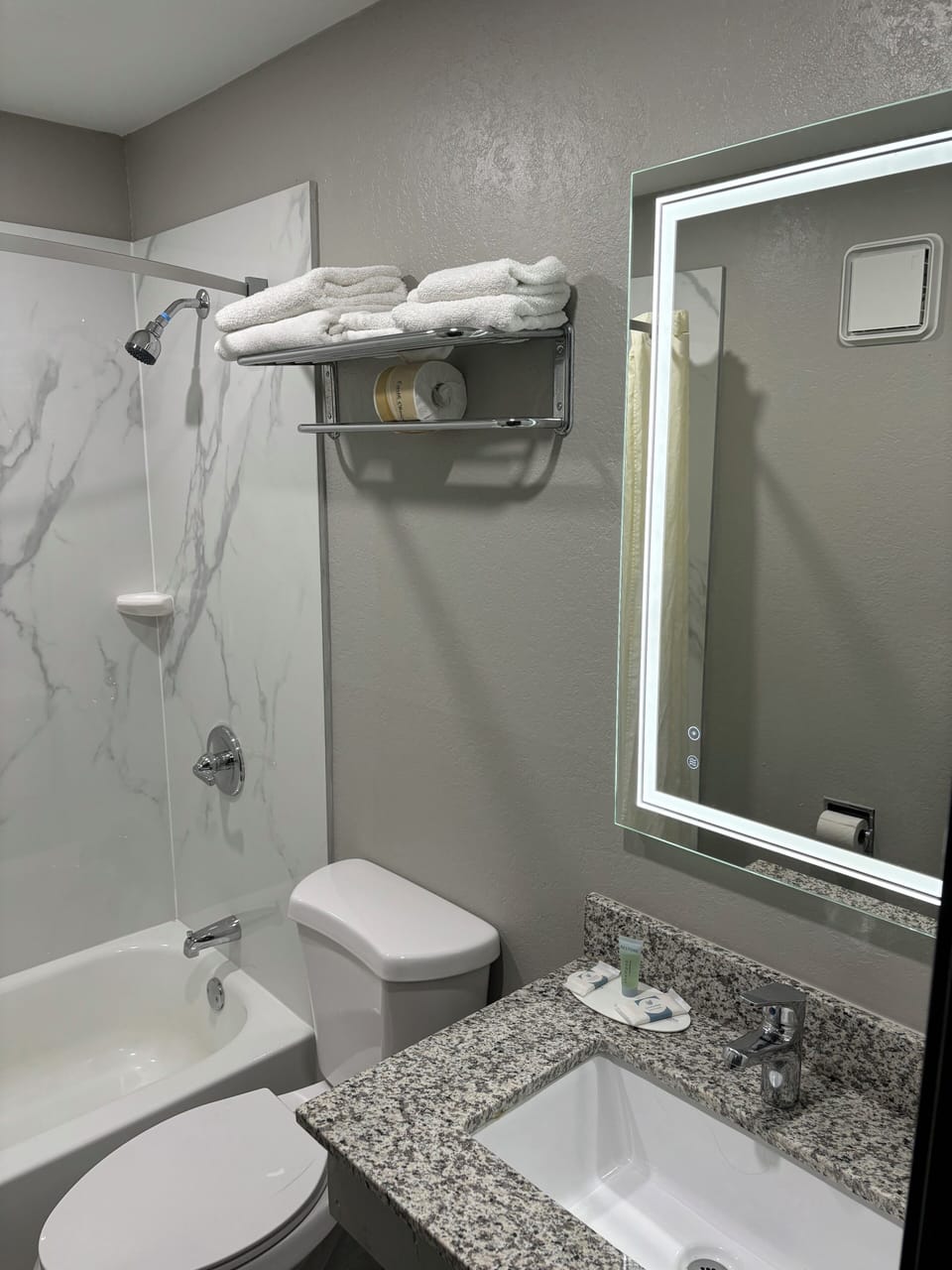 Bathtub, free toiletries, hair dryer, towels