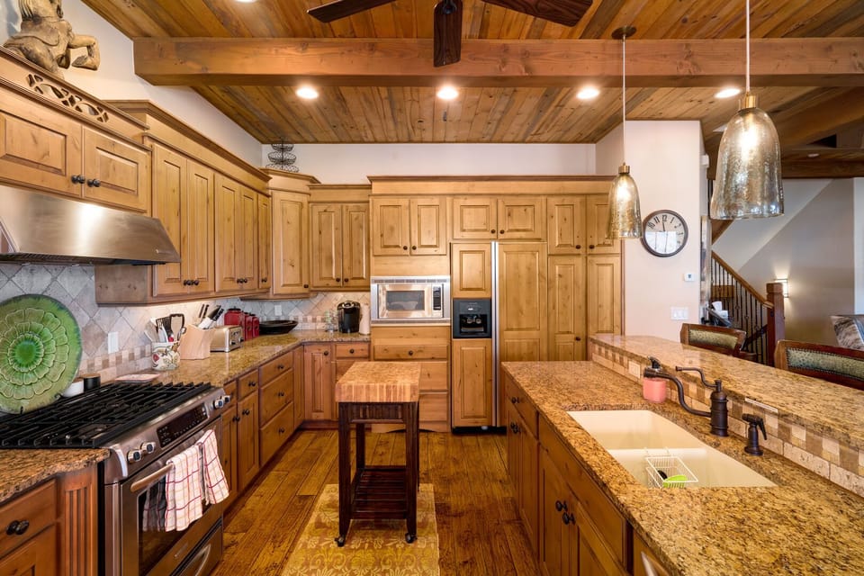 Every cabinet is filled with everything you could ever want in the fully stocked kitchen!