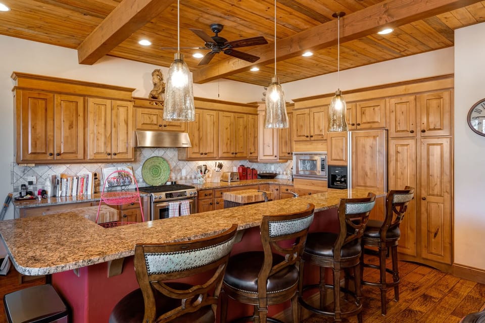 Seating for 4 at the breakfast bar.