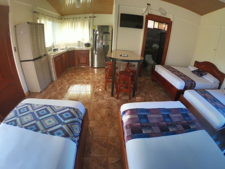 Family Room, 1 Bedroom | Pillowtop beds, in-room safe, desk, laptop workspace