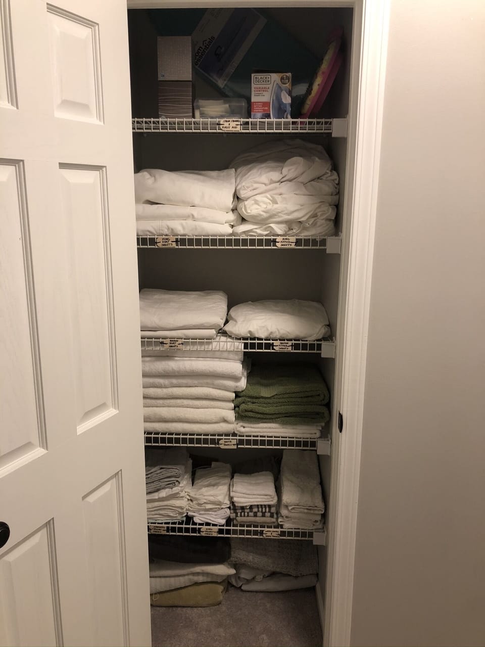 Linen closet with towels/extra bed sheets, iron, first aid kits, etc