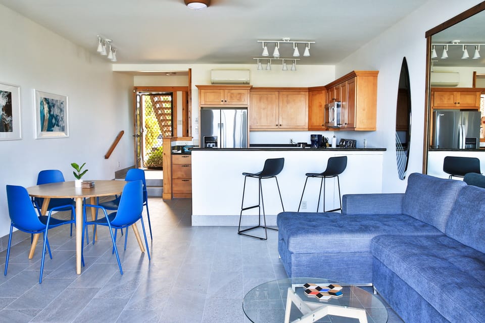 Sectional for lounging and bar stools for casual dining