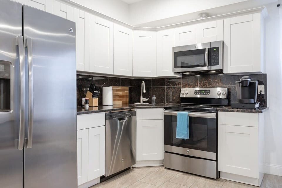 Full size stainless steel kitchen with essential cookware