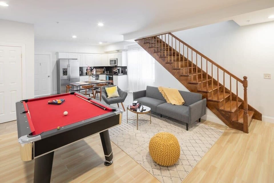 Living Room - Sleek pool table and hangout space