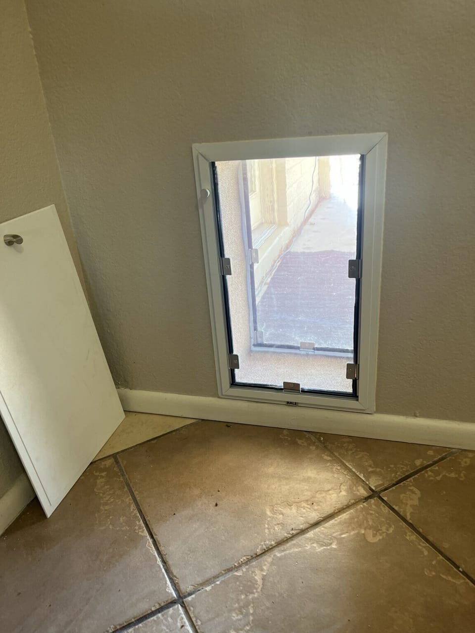 Pet door with safety partition when not in use. 
