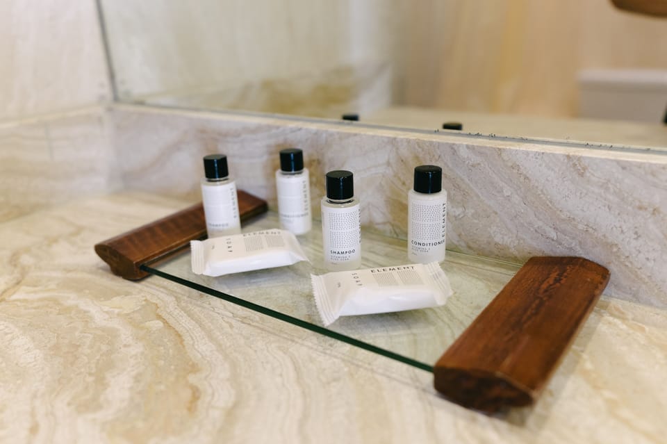 Deluxe Double Room | Bathroom | Combined shower/tub, deep soaking tub, rainfall showerhead, hair dryer