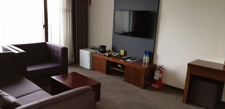 Superior Room | Living area | Flat-screen TV