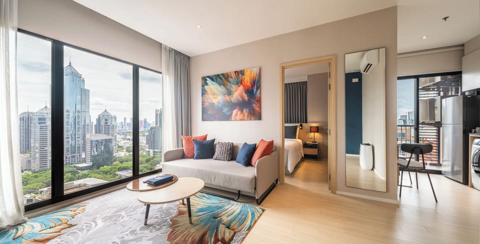 Suite, 1 Bedroom (Sky) | Living area | 49-inch LCD TV with digital channels, TV