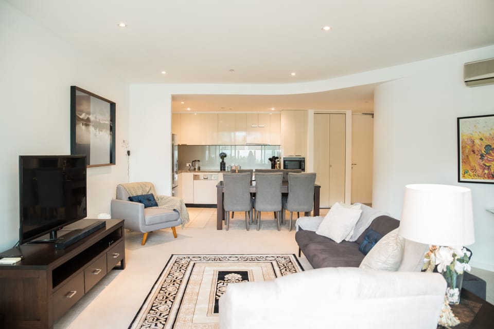 Executive Apartment | Living area | 55-inch LCD TV with digital channels, TV, Netflix