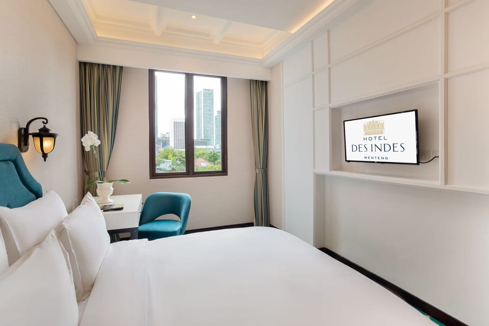Deluxe Room | Memory foam beds, in-room safe, desk, iron/ironing board