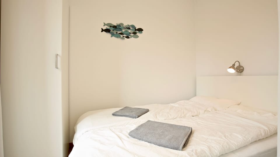 Apartment | 4 bedrooms, blackout drapes, iron/ironing board, free WiFi