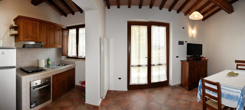 Apartment, 1 Bedroom (Granaio) | Private kitchen | Microwave, cookware/dishes/utensils