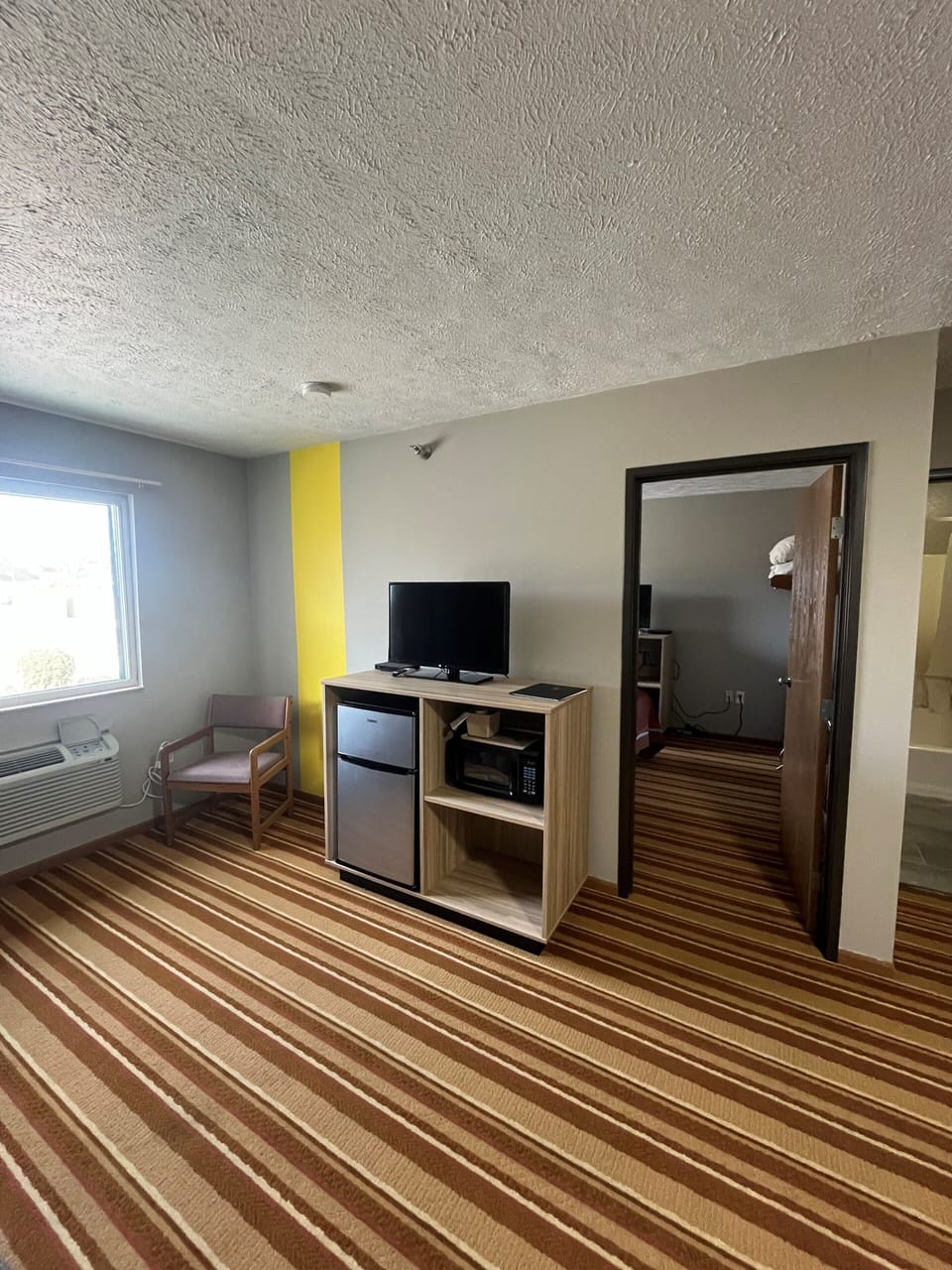 Suite, 1 Queen Bed | Blackout drapes, iron/ironing board, rollaway beds, free WiFi