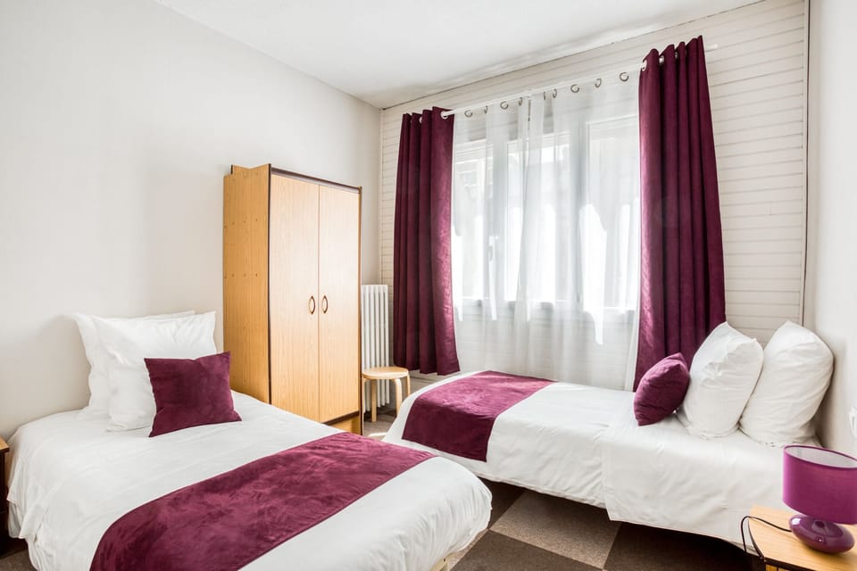 Family Room | Desk, blackout drapes, soundproofing, free WiFi