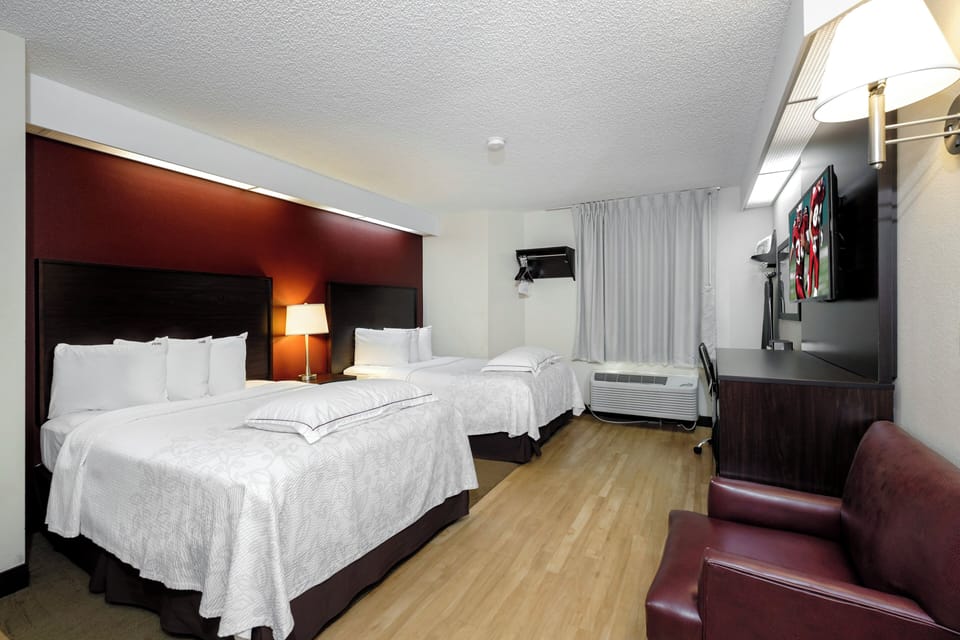 Premium Room, 2 Double Beds, Poolside (Upgraded Bedding & Snack, Smoke Free) | Desk, laptop workspace, blackout drapes, iron/ironing board