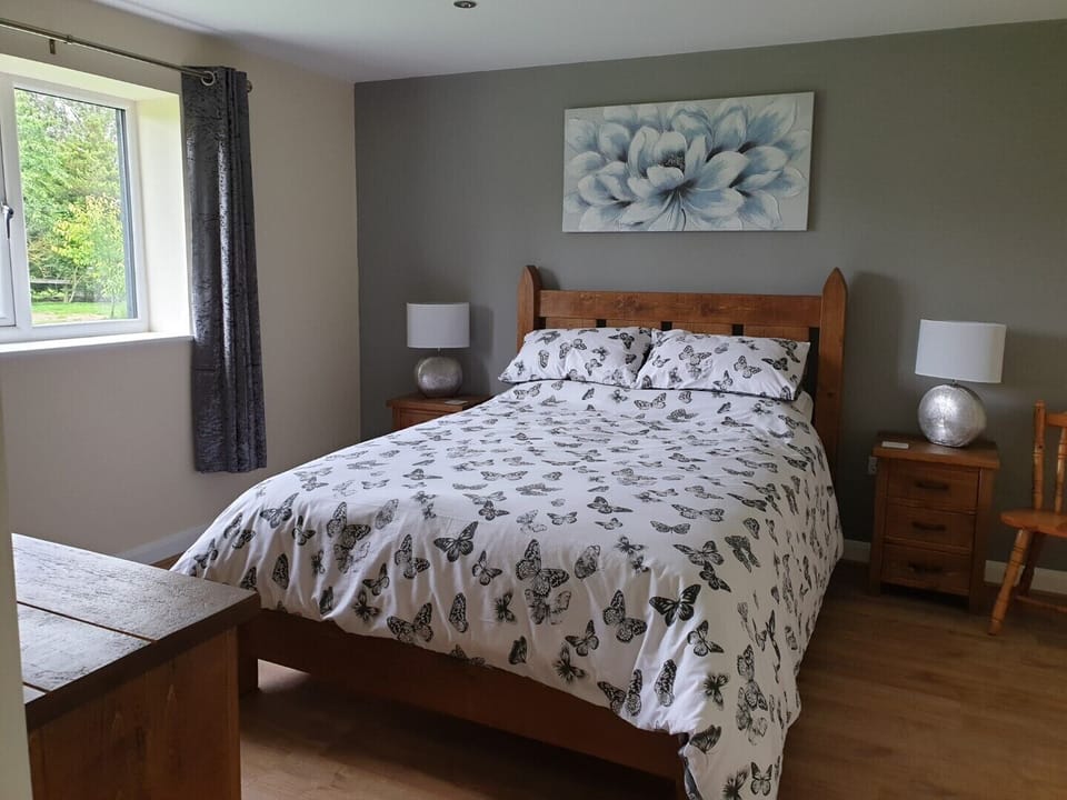 Bed room of The Swallows Nest at Windy Ridge, New Delights