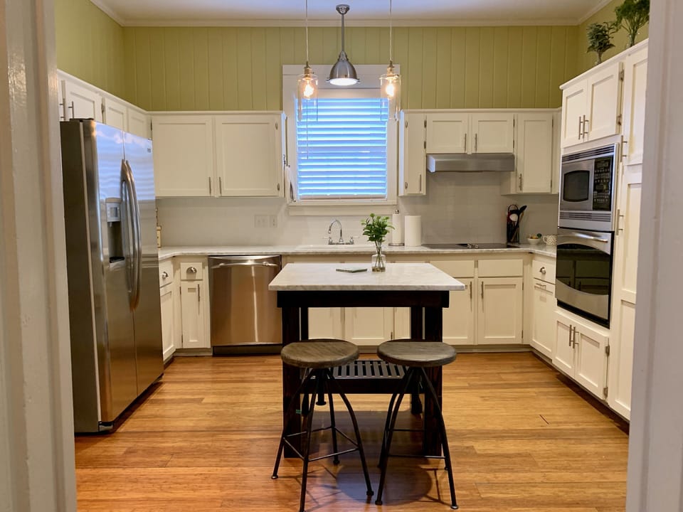 Spacious kitchen with full size stainless steel appliances. 