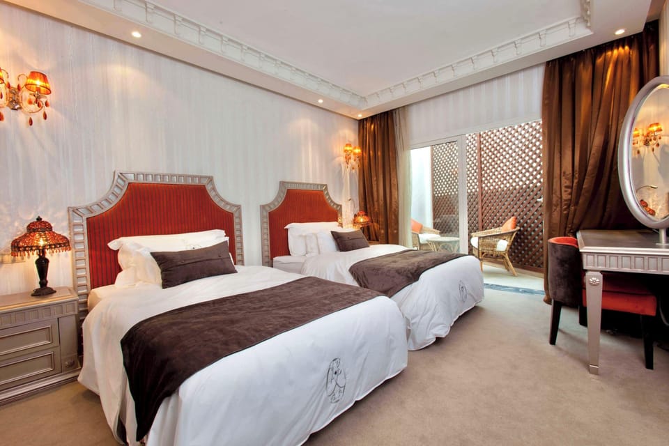 Hypo-allergenic bedding, memory foam beds, minibar, in-room safe