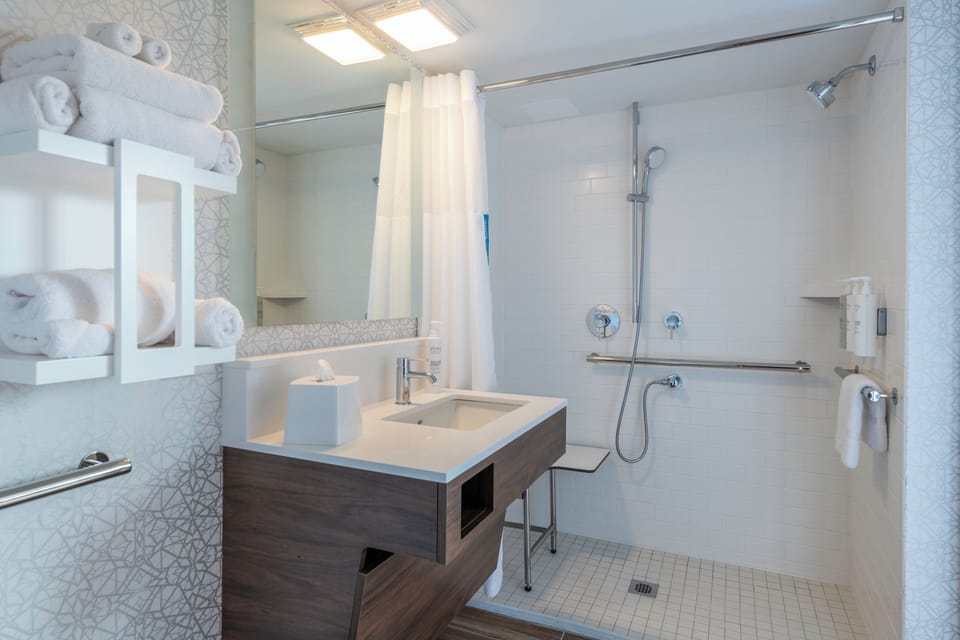 Suite, 1 King Bed, Accessible (Mobility & Hearing, Roll-in Shower) | Bathroom | Hair dryer, towels