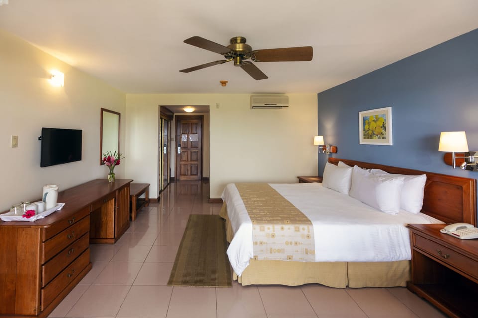 Premium bedding, down comforters, in-room safe, laptop workspace