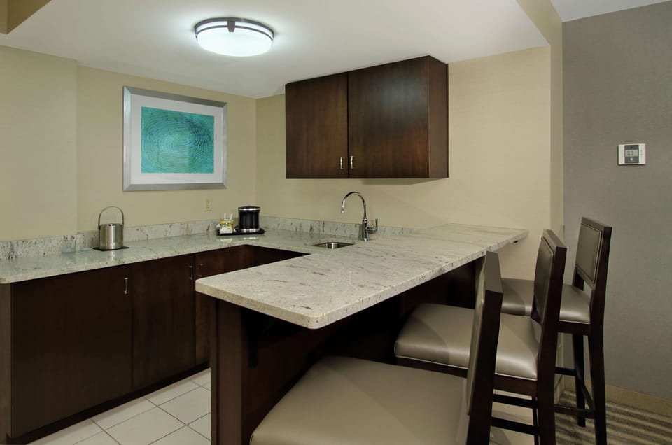 Suite, 1 King Bed | Private kitchen | Fridge, coffee/tea maker