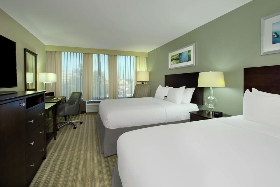 Room, 2 Queen Beds | Premium bedding, in-room safe, blackout drapes, iron/ironing board