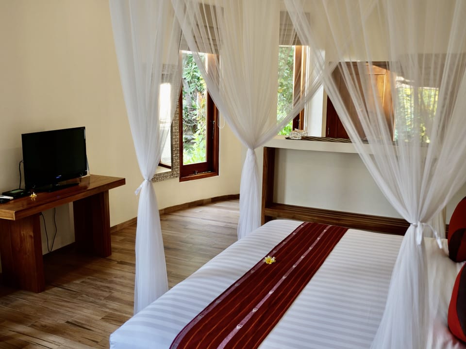 Deluxe Double Room | Premium bedding, in-room safe, desk, laptop workspace