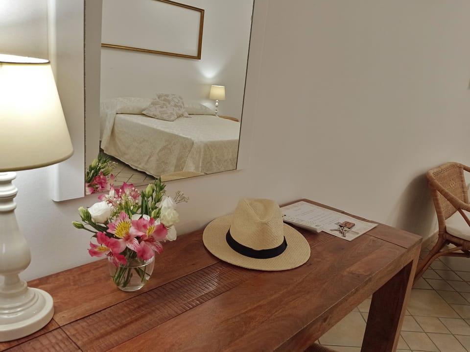Comfort Room, 1 Double Bed, Patio, Ground Floor | Down comforters, minibar, in-room safe, individually decorated
