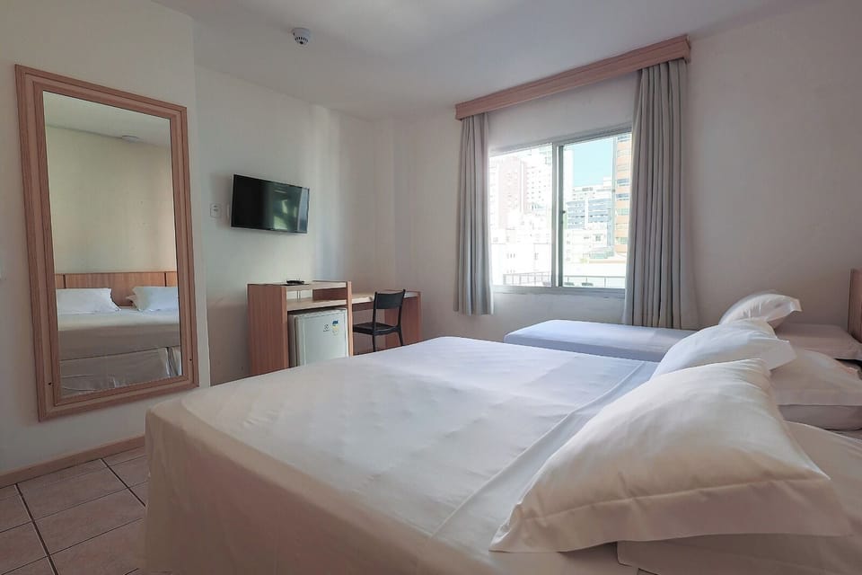 Standard Triple Room | Minibar, in-room safe, blackout drapes, free WiFi