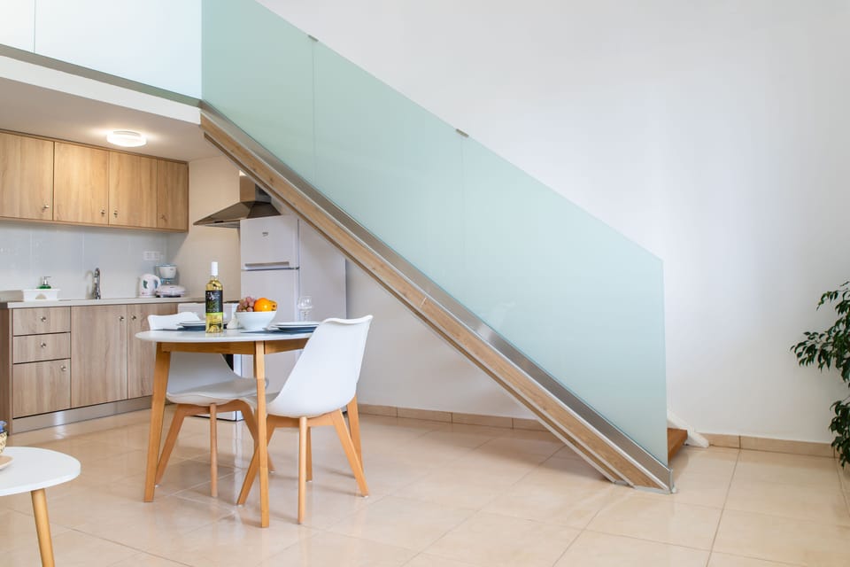 Deluxe Loft (Duplex, 2 Persons) | Private kitchenette | Coffee/tea maker, full-size fridge, oven, stovetop