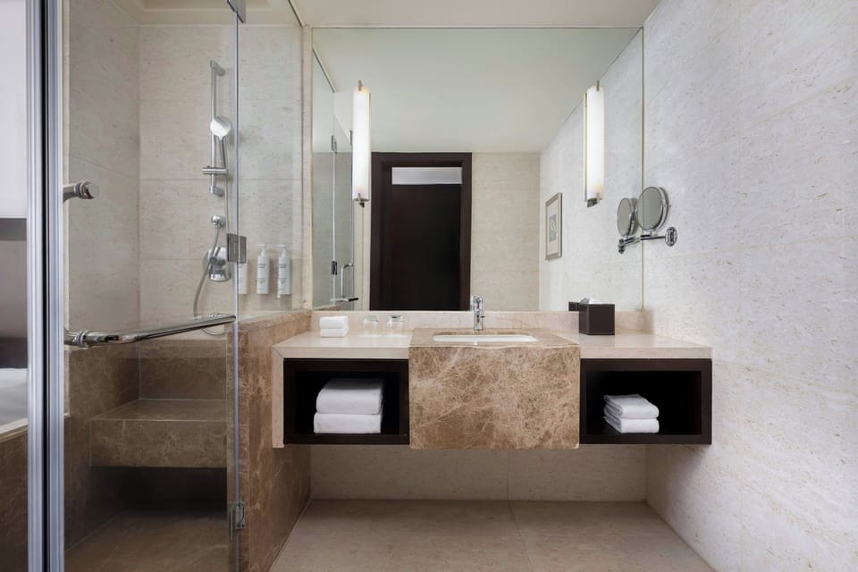 Combined shower/tub, free toiletries, hair dryer, bathrobes