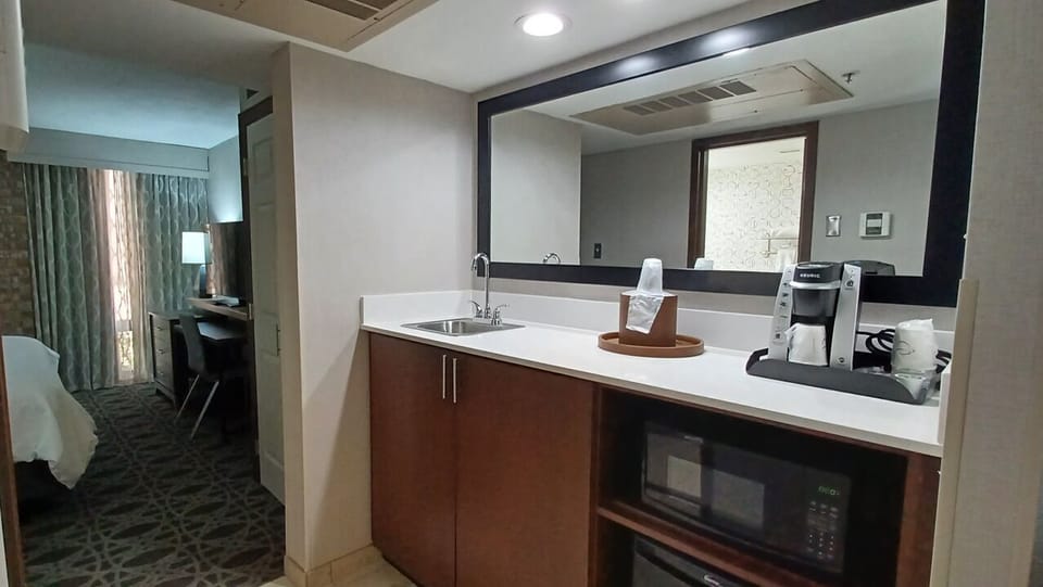 Suite, 1 King Bed | In-room dining