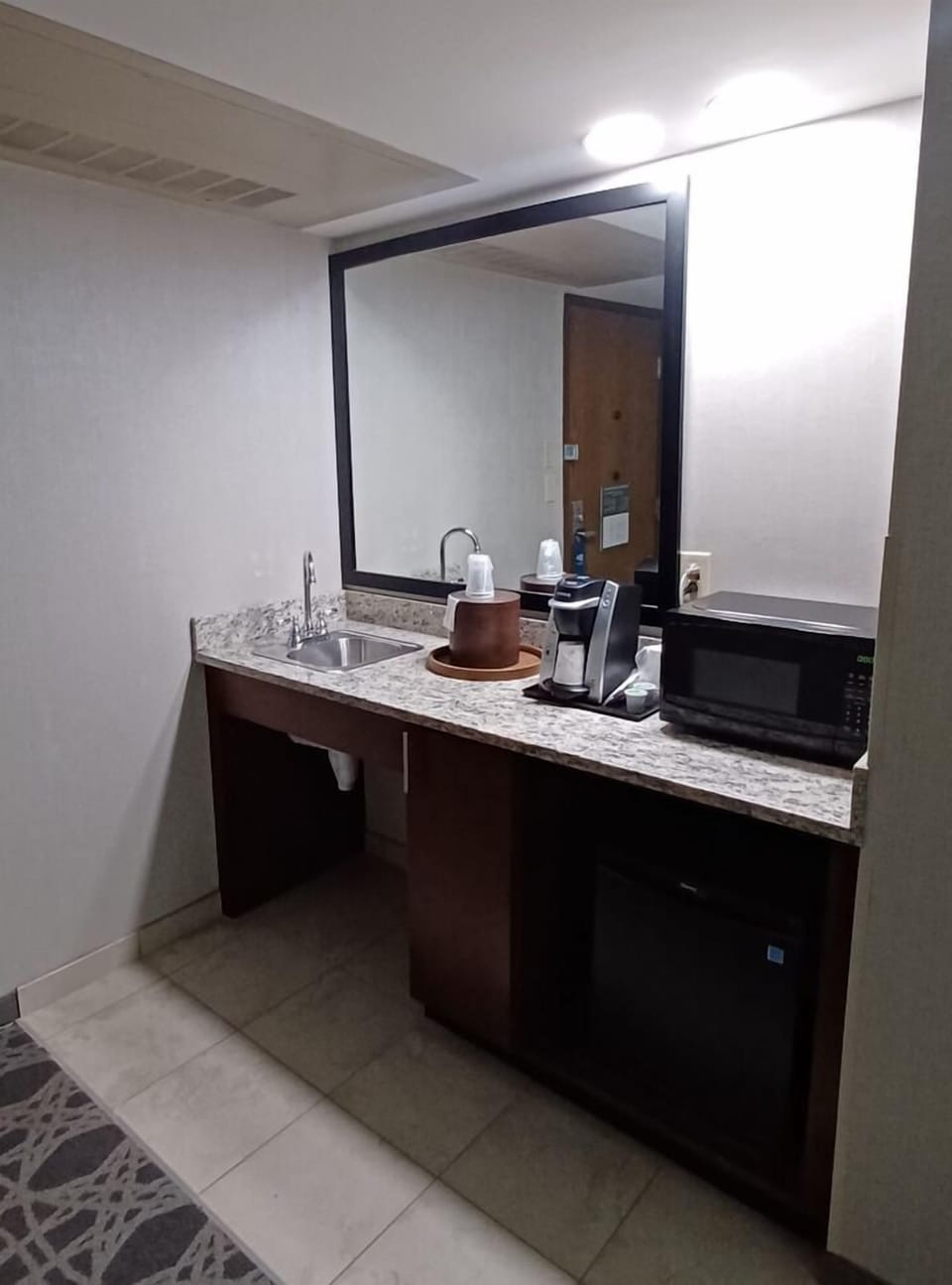 Desk, iron/ironing board, cribs (free), WiFi (free)