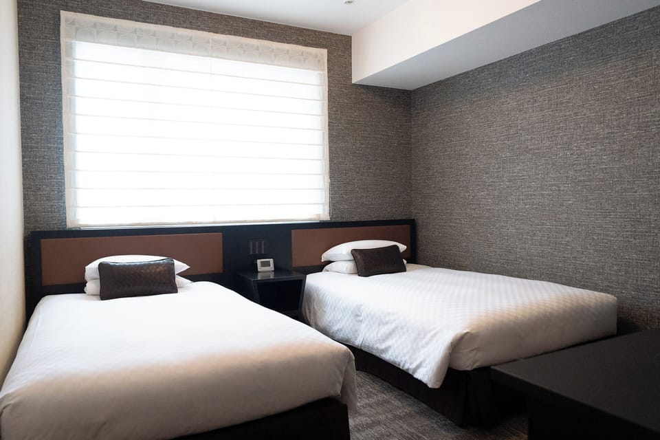 Premium bedding, down comforters, desk, blackout drapes