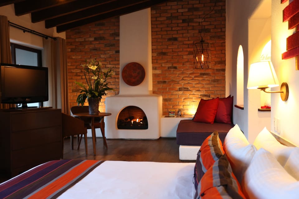 Junior Suite | Down comforters, in-room safe, individually decorated