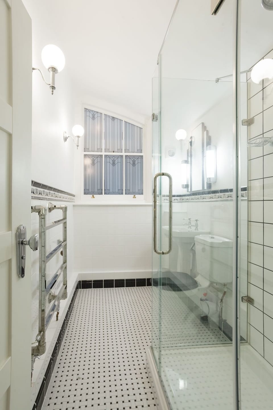Bathroom next to cinema room with underfloor heating.