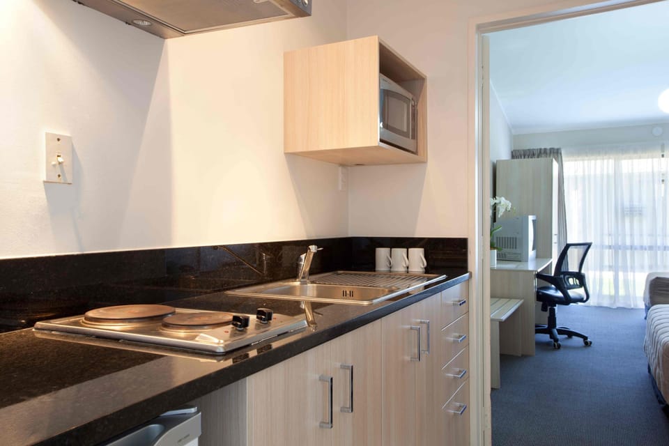 Mini-fridge, microwave, stovetop, electric kettle